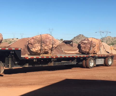 Flat bed with 3 large boulders