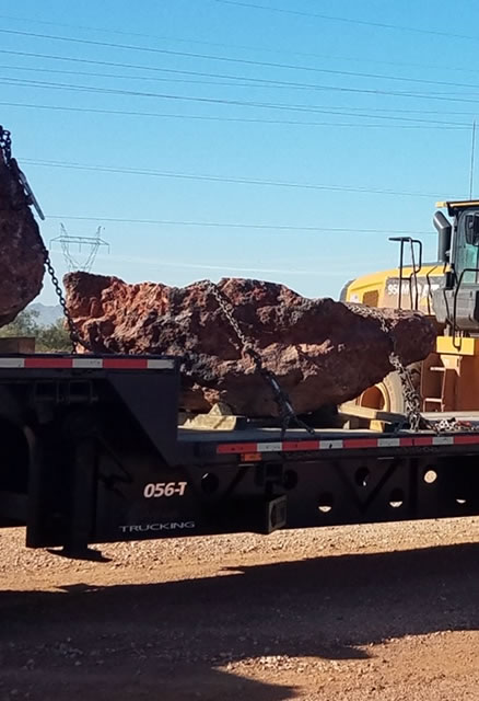 Flat bed with 1 large boulder visible